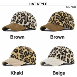 Detail view of leopard print plush baseball caps in brown and beige corduroy fabric