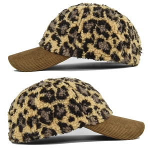 Detail of leopard print fleece baseball cap with brown corduroy brim and warm texture