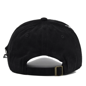 Detail view of black vintage baseball cap with adjustable metal buckle and distressed fabric