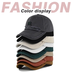 Multiple vintage baseball caps with RR embroidery and frayed edges in eight colors