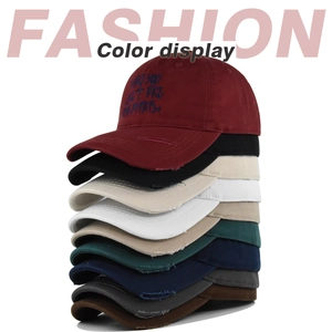 Detailed color display of distressed cotton baseball caps with cross embroidery