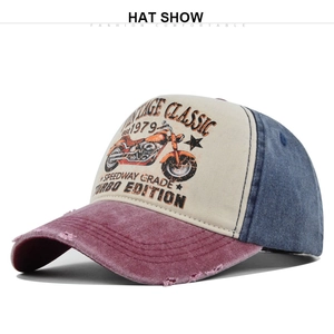 Detailed view of vintage washed baseball cap with contrast stitching and embroidery