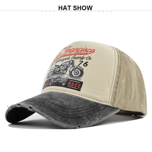 Close-up of distressed brim and vintage San Francisco motorcycle print on baseball cap