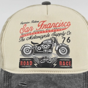 Detailed macro view of vintage San Francisco motorcycle print on washed cotton baseball cap