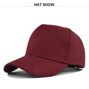 Detail view of burgundy 5-panel cotton baseball cap showing durable twill texture