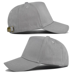 Detail view of grey cotton baseball cap showing adjustable bronze metal buckle and stitching