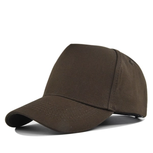 Detailed close-up of dark brown structured cotton baseball cap with multi-stitch curved brim