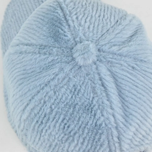 Top view of plush light blue mink fur baseball cap with radial texture and center button