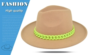 Detail of light brown wool fedora hat featuring a striking neon green chain band decoration