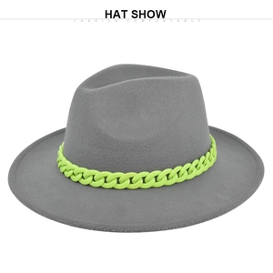 Detail of grey felt jazz hat with a vibrant fluorescent green plastic chain decoration