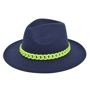 Detail view of navy blue wide brim fedora hat with a neon yellow chain accessory