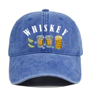 Detailed view of Whiskey print and graphic illustrations on washed blue denim baseball cap