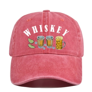 Detail of vintage washed baseball cap featuring a whiskey and beer glass graphic print