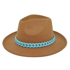 Detailed texture of camel wool fedora with a decorative bright blue chunky chain link