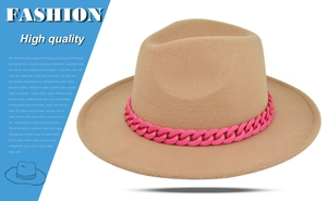 Detail of khaki wide brim wool fedora hat featuring a stylish pink chunky chain decoration