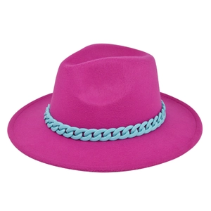 Close-up of fuchsia wool fedora hat with contrast sky blue resin chain decoration