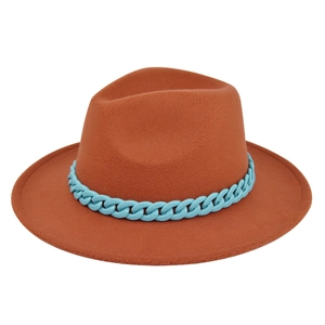 Detail view of a brown wide-brim wool fedora hat with a blue acrylic chain accessory