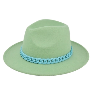 Detailed macro view of light green wool fedora with decorative blue plastic chain link