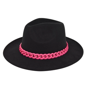 Detail of black wool fedora hat featuring a chunky pink plastic chain decoration