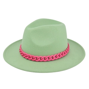 Detail of light green wool fedora hat featuring a chunky pink plastic chain accessory