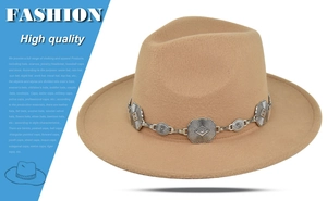 Close-up of a camel wool felt hat with decorative silver flower chain detailing