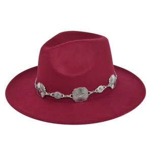 Detailed view of dark red wool fedora featuring an ornate silver engraved chain band