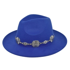 Detail of royal blue fedora hat with a decorative silver floral metallic hatband