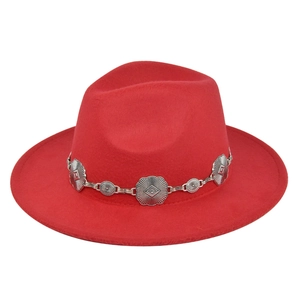 Detail of red wool fedora hat featuring a vintage silver metal chain with floral engraving