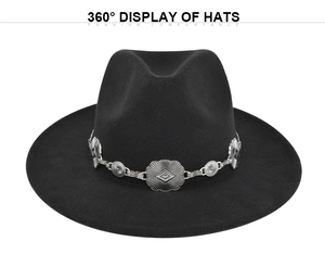 Detailed close-up of a black fedora hat with an engraved silver decorative metal band