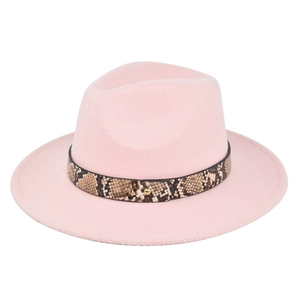 Detailed macro view of a pink felt fedora with a snake pattern band and gold metal stud
