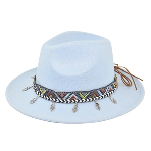 Detail of light blue wide brim wool fedora with ethnic band and heart pendant