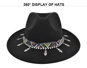 Detail of black wool fedora featuring colorful ethnic woven band and silver leaf charms