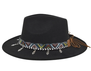 Detail of black fedora hat featuring bohemian ethnic band and silver leaf pendants
