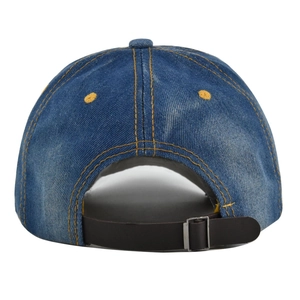 Detail of blue denim baseball cap with yellow stitching and adjustable leather strap