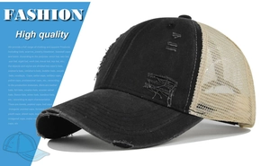 Detalle de la lona negra desgastada y la malla beige en gorra de béisbol estilo vintage