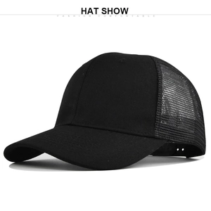 Detail view of black trucker hat with breathable mesh back and classic curved brim