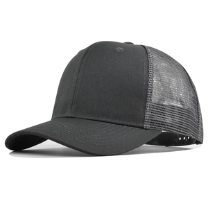 Detail of a breathable mesh back and adjustable strap on this classic black trucker hat