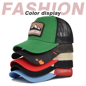 Five assorted mesh trucker hats with mountain embroidery patches and curved brims