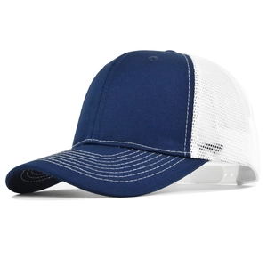 Detailed side view of navy baseball cap with white breathable mesh and contrast stitching