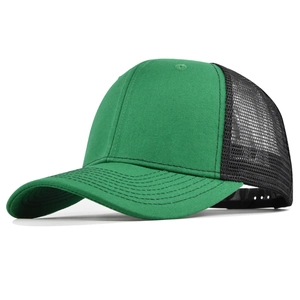 Detail of green mesh trucker hat showing high-quality stitching and breathable back panel