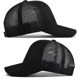 Side view of black trucker hat featuring breathable mesh panels and curved brim design