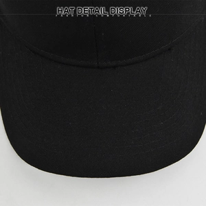 Macro shot of durable cotton twill fabric and neat stitching on black baseball cap visor