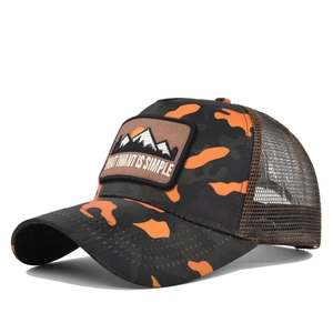 Detail of camouflage trucker hat featuring mountain embroidery and mesh back panels