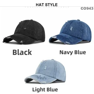 Close-up of distressed denim baseball caps in black, navy blue and light blue colors