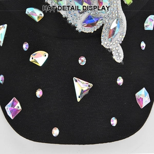 Macro detail of black baseball cap featuring various colorful AB rhinestones and patterns