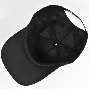 Detail showing the internal six-panel structure and adjustable snapback of the black hat