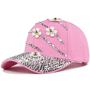 Pink denim baseball cap with rhinestone stripes and white 3D daisy flower decorations