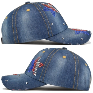 Detail of blue denim baseball cap featuring rhinestones star and metallic rivets