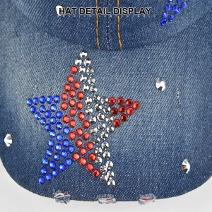 Macro detail of denim baseball cap featuring colorful rhinestone star and distressed brim