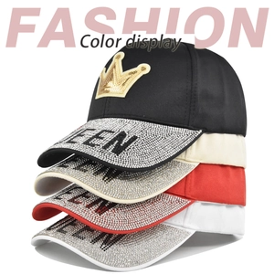 Baseball caps in four colors featuring sequin crowns and rhinestone QUEEN lettering